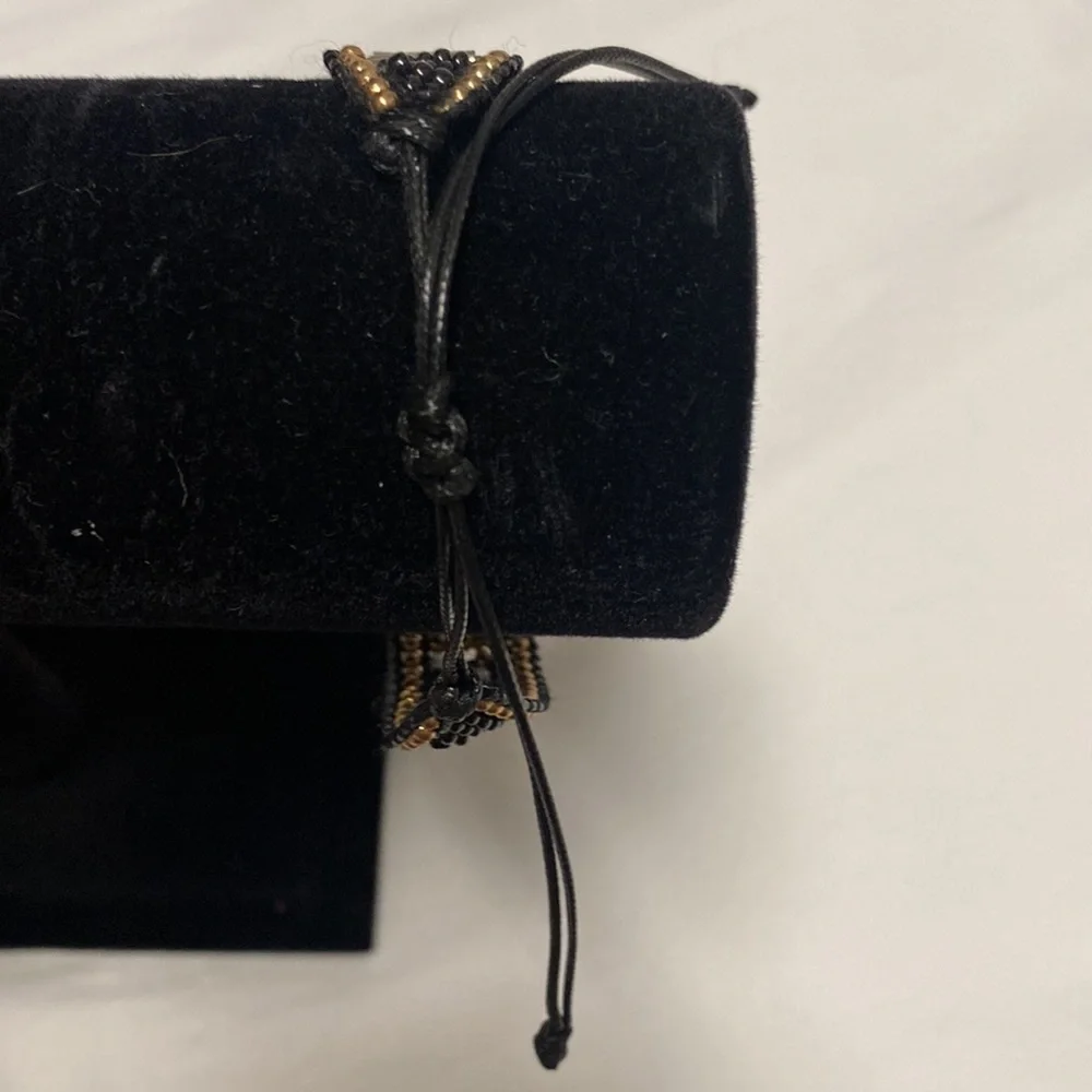 Gold black white and silver beads on black cord Adjustable Size Bracelet. - Picture 3 of 5